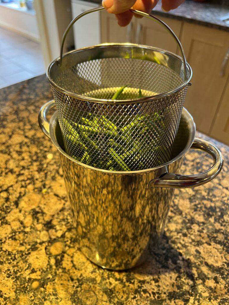 photo of green beans in an asparagus steamer